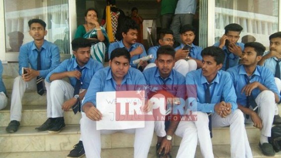 Nursing College Students sit in demonstration at Tripura University demanding results, registration numbers 